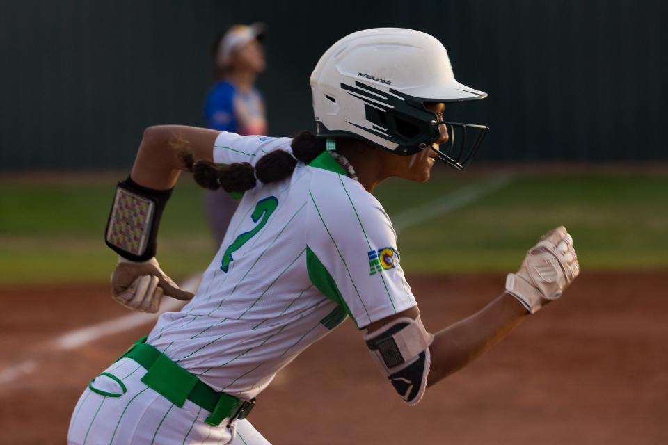 Montwood's Trinity Munoz (2) runs to first base after hitting a home run at a softball game against Americas High School Thursday, March 28, 2024, at Montwood High School, in El Paso, TX.