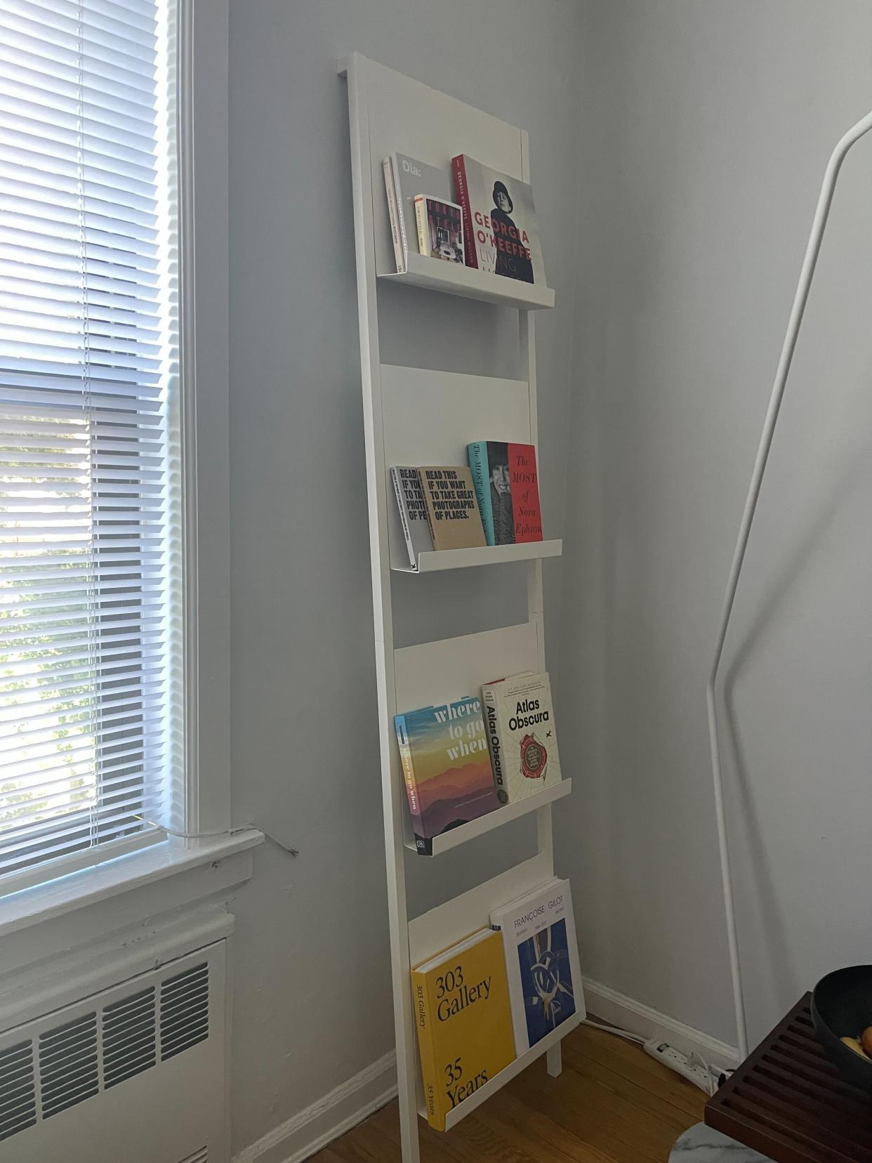 Associate editor Justin Krajeski loves the design of his Pottery Barn Temple Street Display for showing off coffee table books. (Courtesy Justin Krajeski)