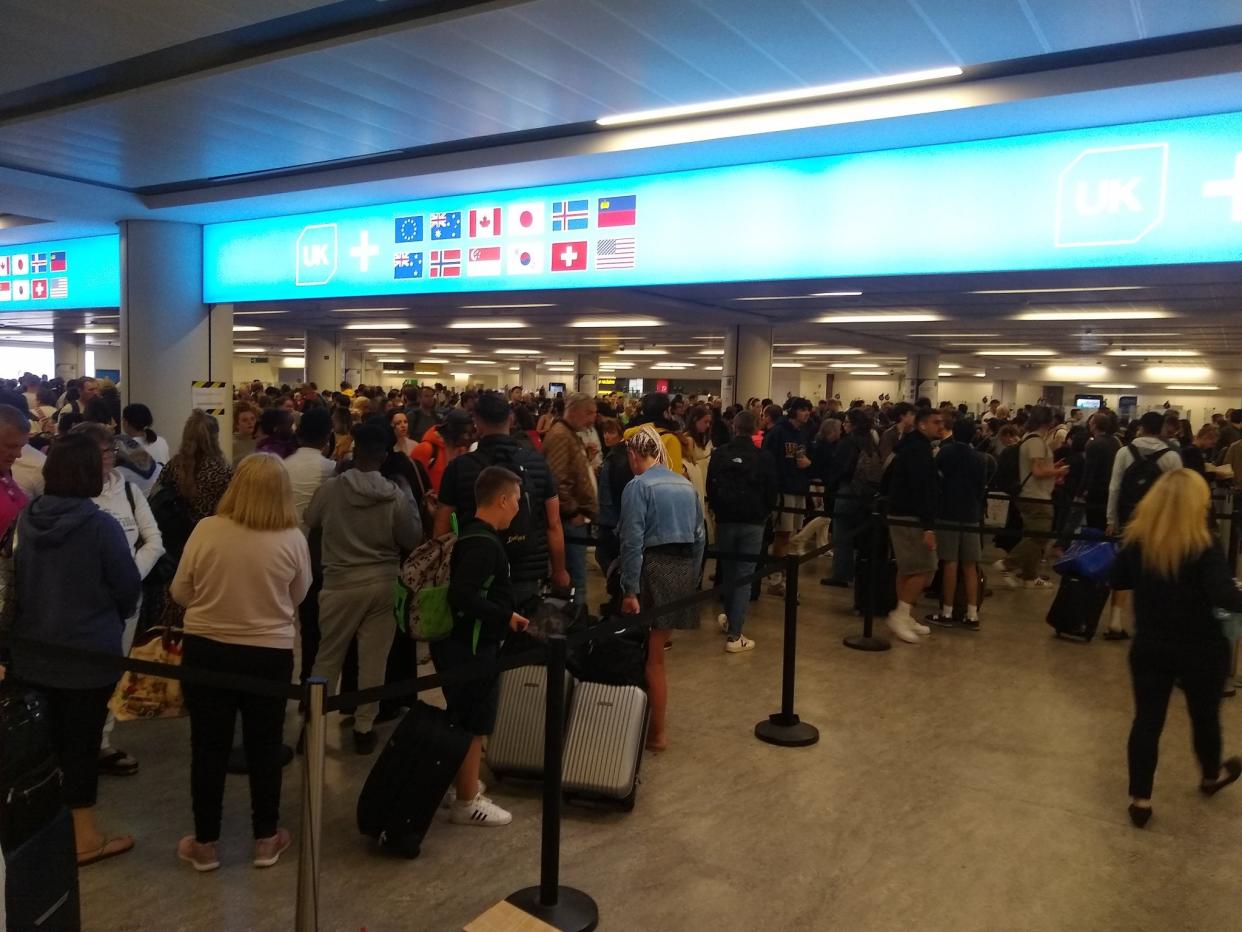 Passengers are facing travel chaos as electronic passport gates have gone down across UK airports (Chris O’Hara)