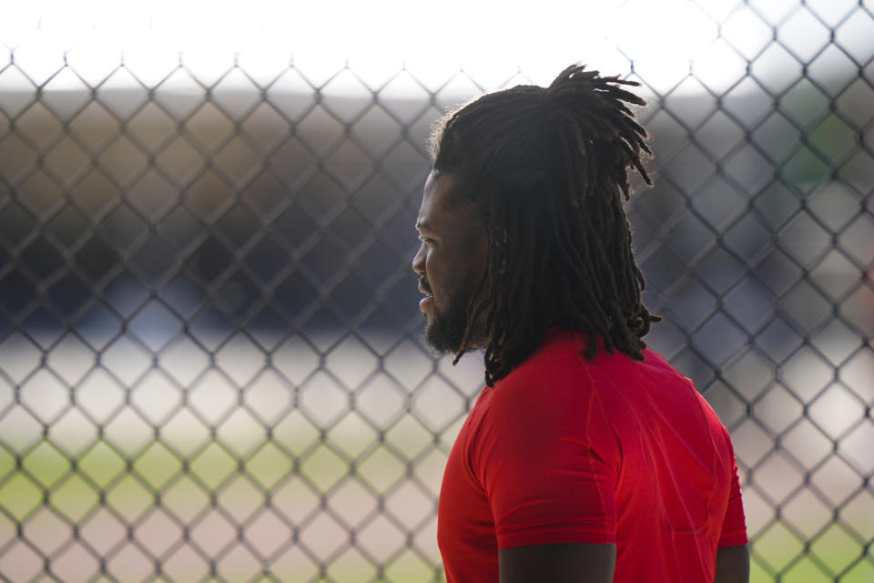 Philadelphia Phillies' Odubel Herrera walks near the field during a spring training baseball workout Wednesday, Feb. 24, 2021, in Clearwater, Fla. (AP Photo/Frank Franklin II)