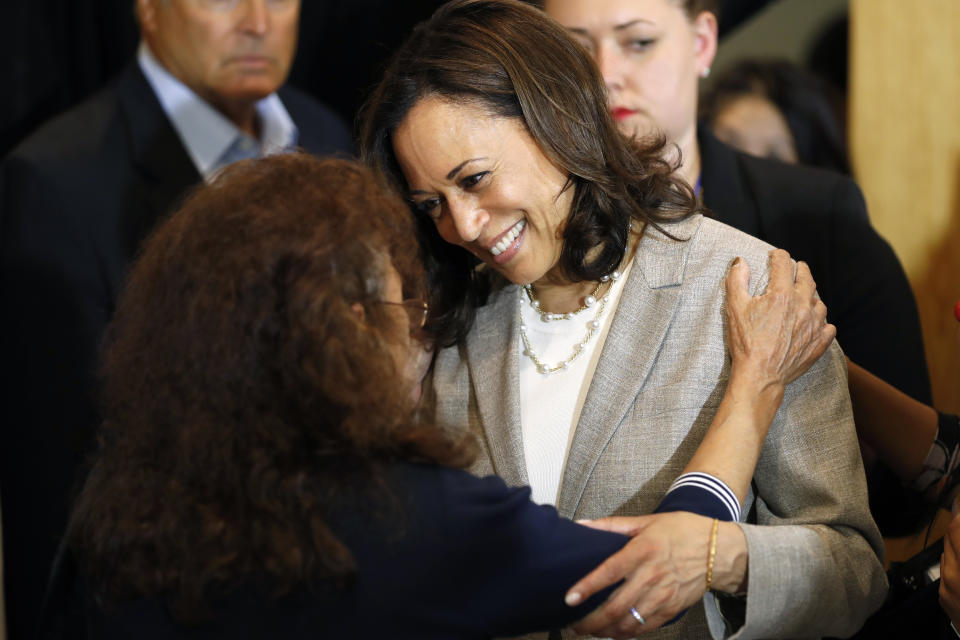 Democratic presidential candidate Sen. Kamala Harris, D-Calif., greets an audience member after speaking at a Women of Color roundtable, Tuesday, July 16, 2019, in Davenport, Iowa. (AP Photo/Charlie Neibergall)