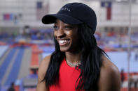 Olympic gold medalist Simone Biles Owens is interviewed after training at the Stars Gymnastics Sports Center in Katy, Texas, Monday, Feb. 5, 2024. Biles begins preparations for the Paris Olympics when she returns to competition at the U.S. Classic in Hartford, Connecticut on Saturday. Biles, who cited mental health concerns while removing herself from several competitions at the Tokyo Olympics, says she is better prepared for the pressure competing presents this time around. (AP Photo/Michael Wyke)