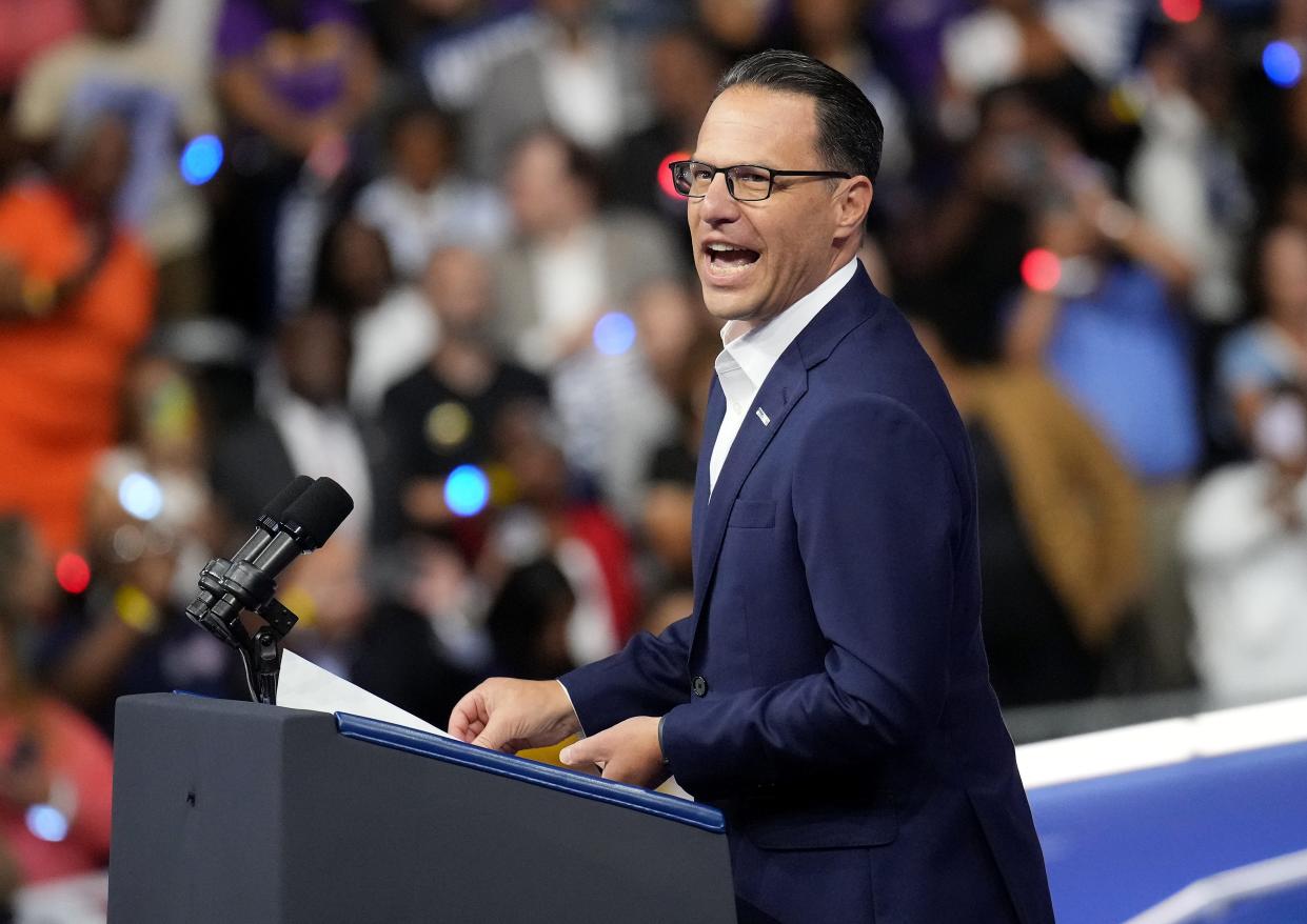 Pennsylvania Gov. Josh Shapiro greets the crowd before the start of a campaign rally with Democratic presidential candidate, U.S. Vice President Kamala Harris and Democratic vice presidential candidate Minnesota Gov. Tim Walz.