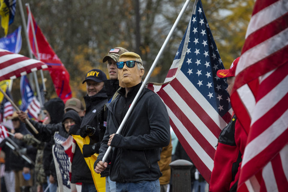 Supporters of President Donald Trump attend a ' Stop The Steal ' rally at the Oregon State Capitol protesting the outcome of the election on Saturday, Nov. 14, 2020 in Salem, Ore. (AP Photo/Paula Bronstein)