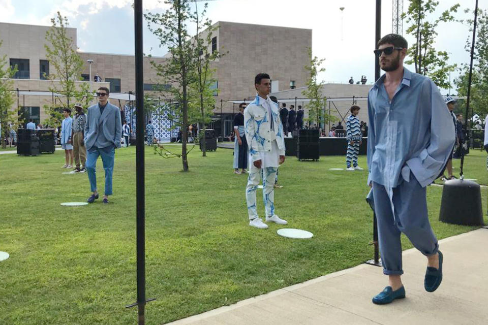 Models wear creations as part of Dolce&Gabbana men's Spring-Summer 2021 collection, presented in Milan, Italy, Wednesday, July 15, 2020. (AP Photo/Colleen Barry)