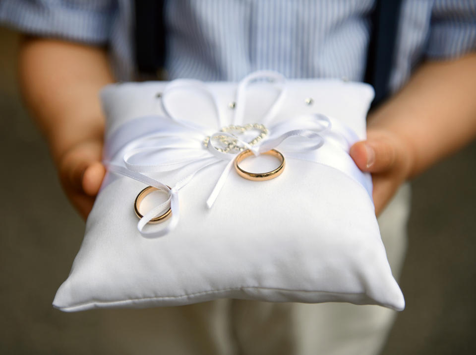 wedding bands on a pillow