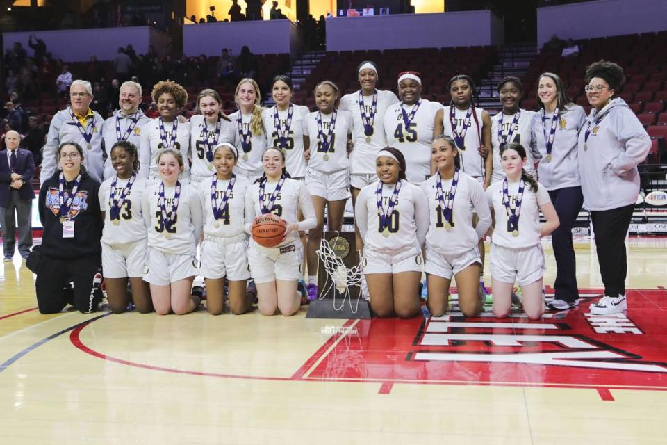 Pictured is the O’Fallon basketball team after defeating Lisle Benet Academy 62-57 in the IHSA Class 4A state championship game at CEFCU Arena (formerly Redbird Arena) on the campus of Illinois State University. For their tremendous season, the Panthers were voted as the Belleville News-Democrat Team of the Year.