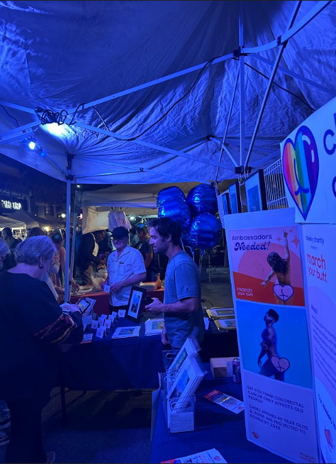 Cheeky Charity Founder David Russo speaks with passersby in downtown Palm Springs during a recent VillageFest.