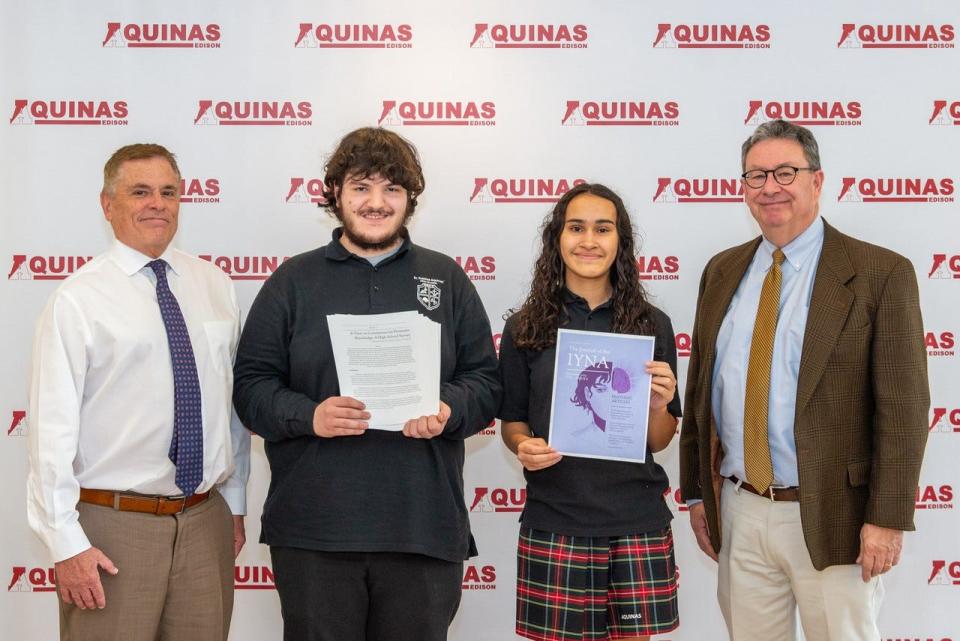 Principal Harry Ziegler and Honors Program Advisor Paul Nolan with Nicholas Tonzola III and Marissa Nieves, holding copies of their research article and the journal in which it was published.