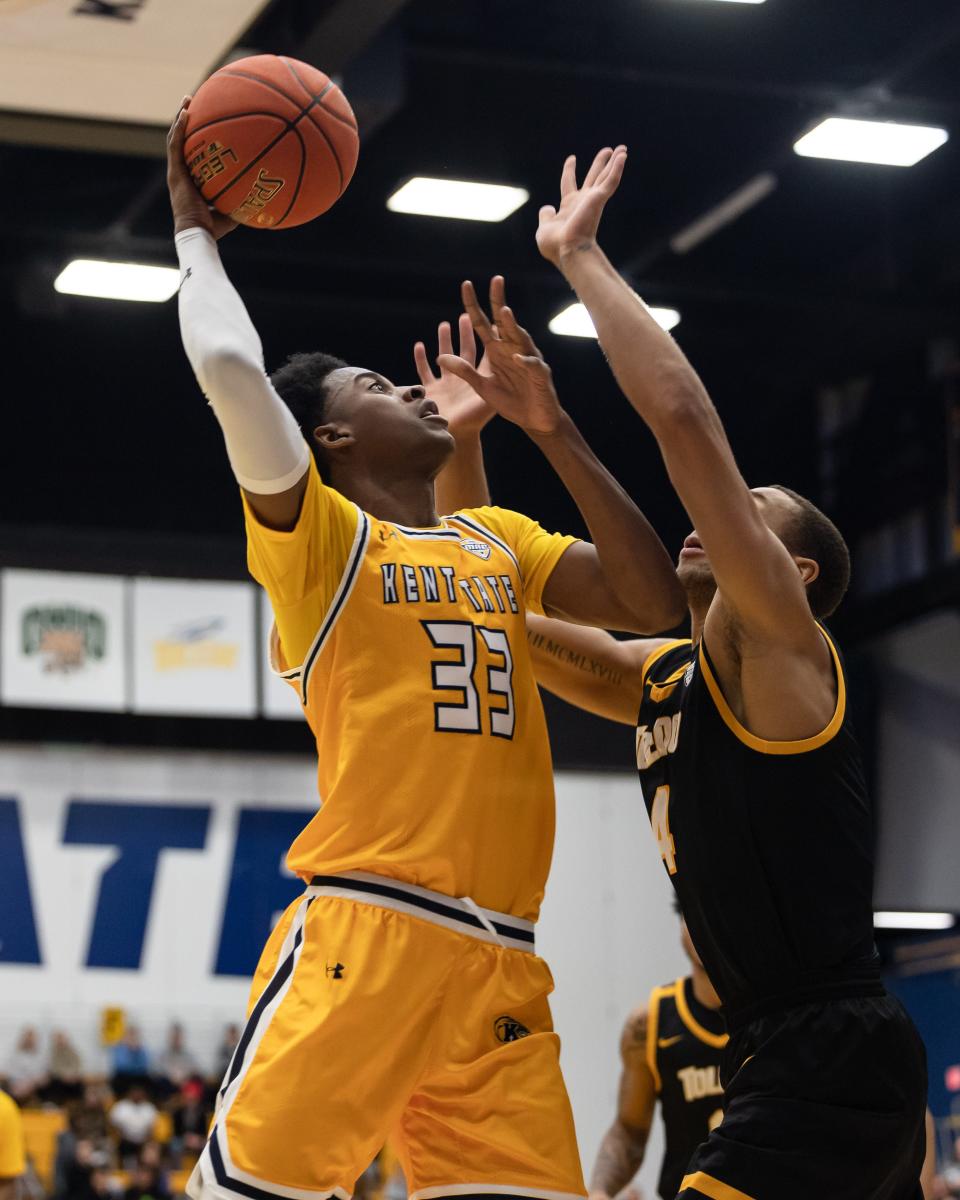 Kent State forward Miryne Thomas goes up to put in a shot during the first half of an NCAA basketball game against the Toledo Rockets, Tuesday, Jan. 10, 2023 at the Kent State M.A.C. Center.