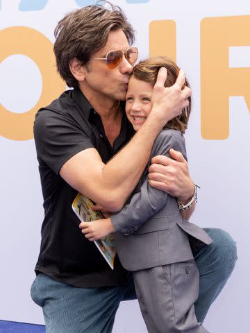 <p>Emma McIntyre/Getty</p> John Stamos and Billy Stamos at the P.S. ARTS 'Express Yourself 2022' event.