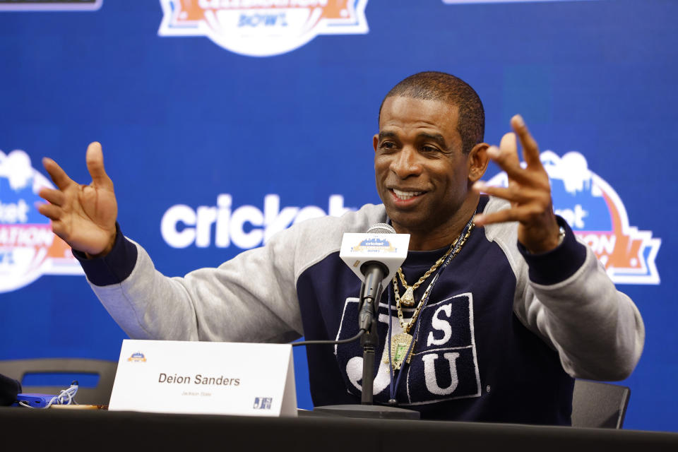 FILE -Deion Sanders speaks during a news conference for the Celebration Bowl NCAA college football game between North Carolina Central and Jackson State, Friday, Dec. 16, 2022 in Atlanta. The University of Colorado introduced a pilot program that makes the credit review for transfer students a more seamless process. It may have been the move that ultimately lured Deion “Coach Prime” Sanders to Boulder. (AP Photo/Todd Kirkland, File)