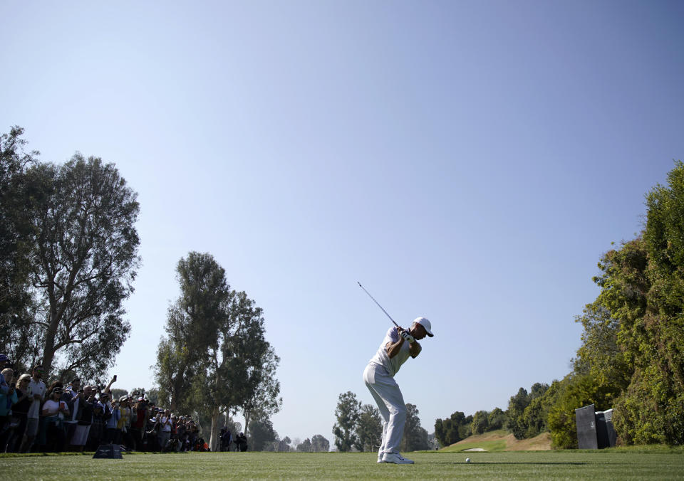 Tiger Woods tees off on the fourth hole during the second round of the Genesis Invitational golf tournament at Riviera Country Club, Friday, Feb. 14, 2020, in the Pacific Palisades area of Los Angeles. (AP Photo/Ryan Kang)