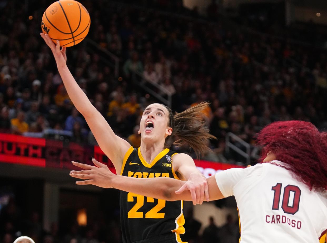 Caitlin Clark drives to the basket in the April 7 title game against South Carolina.