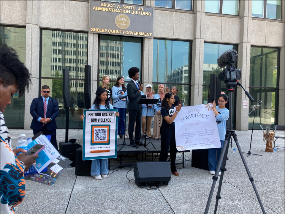 State Rep. Justin J. Pearson stands with the students from MICAH on Saturday, Aug. 19, 2023, in front of the Shelby County Commission building in Downtown Memphis. The students presented gun reform demands they want to see the Tennessee Legislature address.