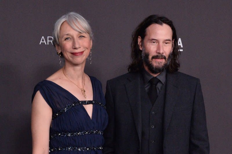 Keanu Reeves (R) and Alexandra Grant attend the LACMA Art+Film gala in 2019. File Photo by Jim Ruymen/UPI