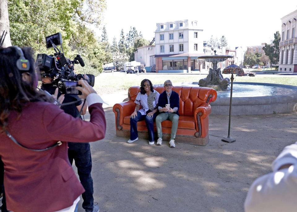 In this photo released by Warner Bros., talk show host Ellen DeGeneres and Michelle Obama are seen during a taping of "The Ellen DeGeneres Show" at the Warner Bros.