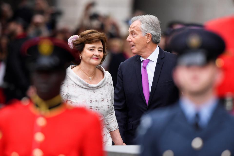 Mr Blair and his wife arriving on Friday (REUTERS)