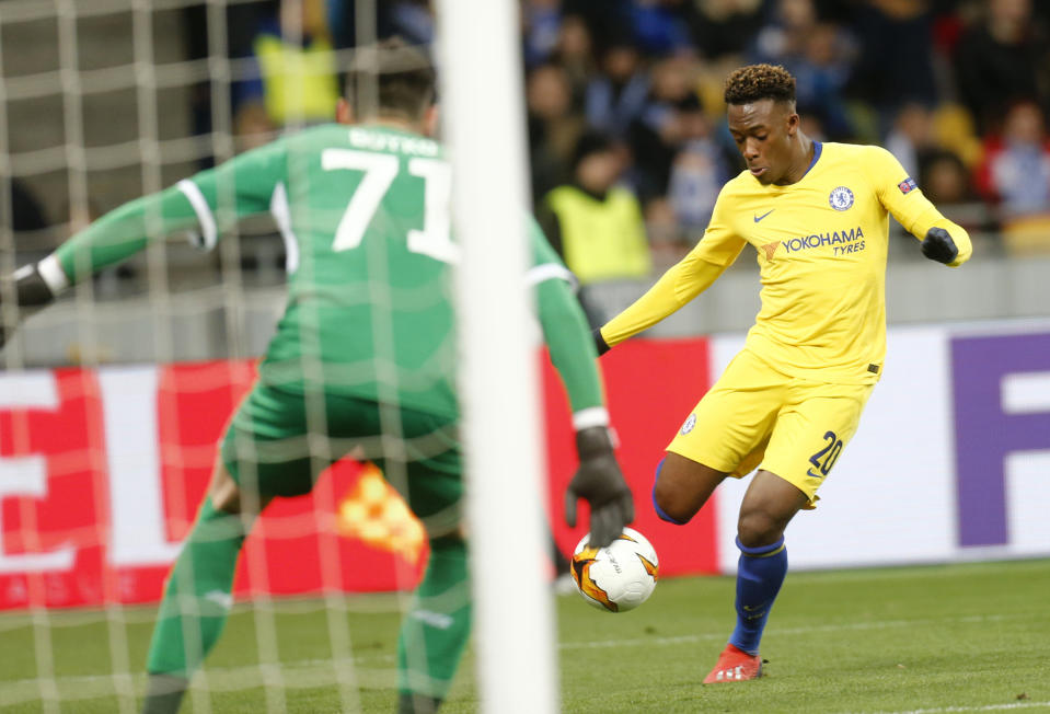 Chelsea's Davide Hudson-Odoi scores his side's fifth goal during the Europa League round of 16, second leg soccer match between Dynamo Kiev and Chelsea at the Olympiyskiy stadium in Kiev, Ukraine, Thursday, March 14, 2019. (AP Photo/Efrem Lukatsky)