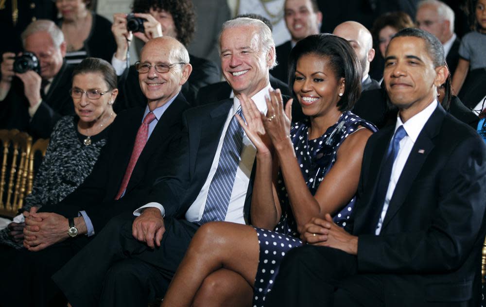 President Barack Obama, first lady Michelle Obama, Vice President Joe Biden, Supreme Court Associate Justices Stephen Breyer and Ruth Bader Ginsburg listen to Regina Spektor perform at an event honoring Jewish American Heritage Month in the East Room of the White House in Washington, May 27, 2010. (AP Photo/Charles Dharapak, File)