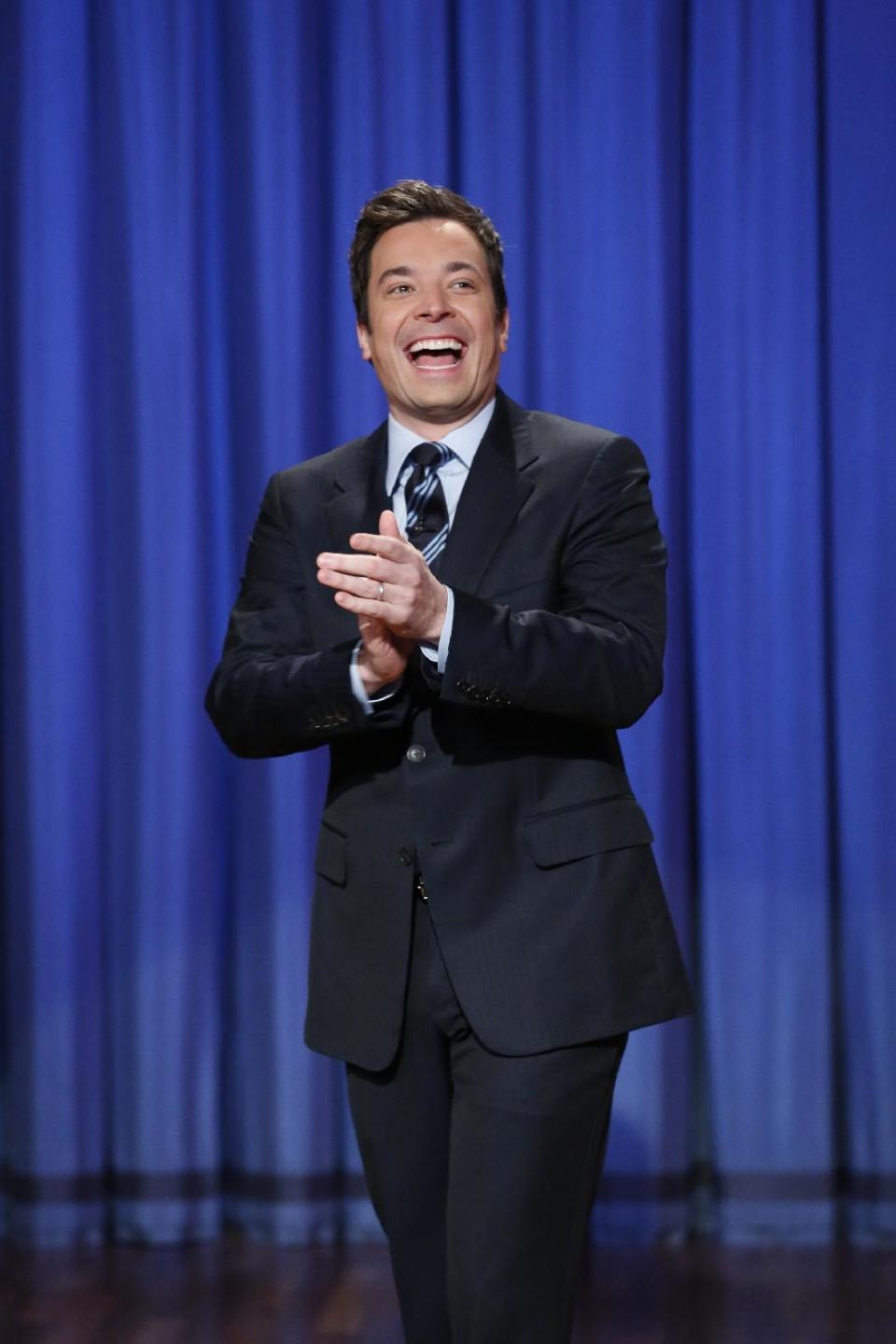 FILE - This April 4, 2013 file photo released by NBC shows Jimmy Fallon, host of "Late Night with Jimmy Fallon," in New York. Fallon will debut as host of his new show, "The Tonight Show with Jimmy Fallon," on Feb. 17. (AP Photo/NBC, Lloyd Bishop, File)