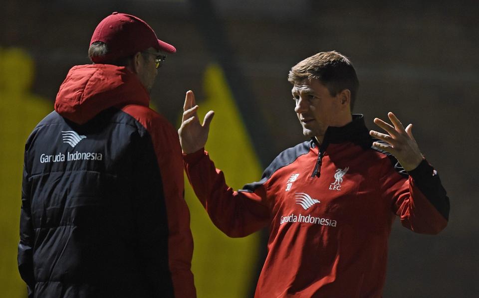 Steven Gerrard with Manager Jurgen Klopp during a training session at Melwood Training Ground on December 12, 2015 in Liverpool, England - John Powell/Liverpool FC via Getty Images