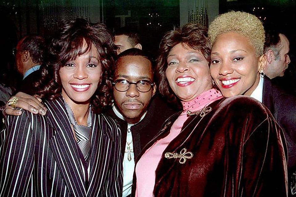 Whitney Houston with Bobby Brown and Robyn Crawford (far right): Rex