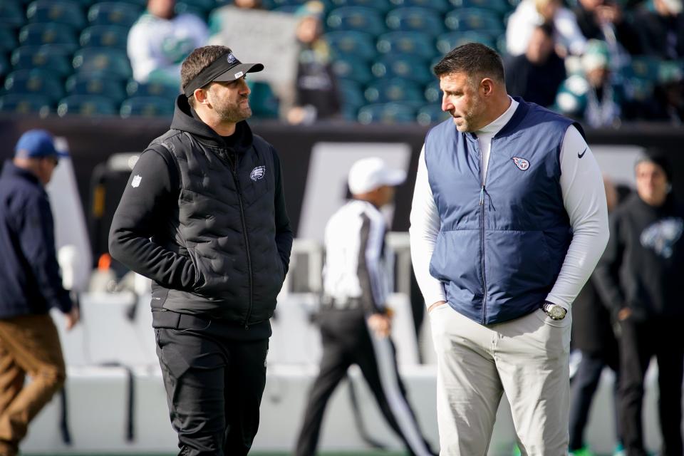 Philadelphia Eagles head coach Nick Sirianni and Tennessee Titans head coach Mike Vrabel talk before their teams face off at Lincoln Financial Field Sunday, Dec. 4, 2022, in Philadelphia, Pa. 