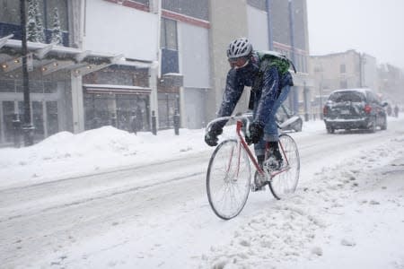 bicycle courier in winter snow...