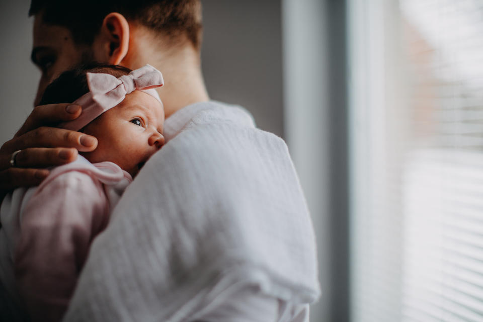 One in 10 fathers will experience postpartum depression. (Image via Getty Images)