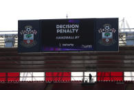 Screen shows the VAR decision to award a penalty after handball by Tottenham Hotspur's Matt Doherty during the Premier League match at St Mary's Stadium, Southampton.