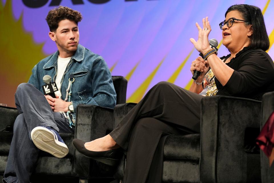 Nick Jonas listens as Mireya Martínez speaks about her experience with diabetes. Martínez, a United Methodist Church minister, talked about the misconception that diabetes is something she got by making poor choices. She has a family history of diabetes and family members who died of it.