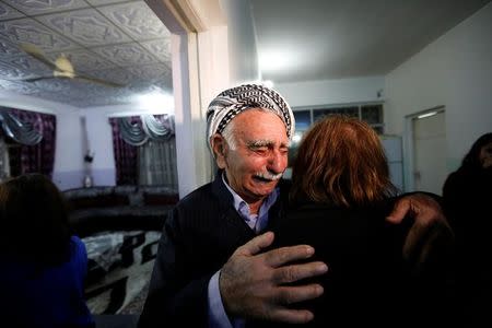 Father of Fuad Sharef, an Iraqi with an immigration visa who was prevented with his family from boarding a flight to New York a week ago,reacts in Erbil, the capital of the Kurdish region in northern Iraq February 4, 2017, before going to the airport to fly, on Turkish Airlines, to Nashville, Tennessee, their new home. REUTERS/Ahmed Saad