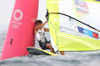 <p>FUJISAWA, JAPAN - JULY 26: Cavit Biriz Onur of Turkey rounds a mark in the Mens Windsurfer RSX on day three of the Tokyo 2020 Olympic Games at Enoshima Yacht Harbour on July 26, 2021 in Fujisawa, Kanagawa, Japan. (Photo by Phil Walter/Getty Images)</p> 