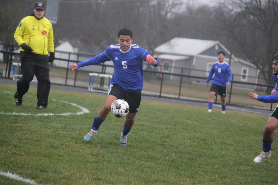 Perry's Jonathan Munoz works to control the ball on Monday, April 1, 2024, at Dewey Field.