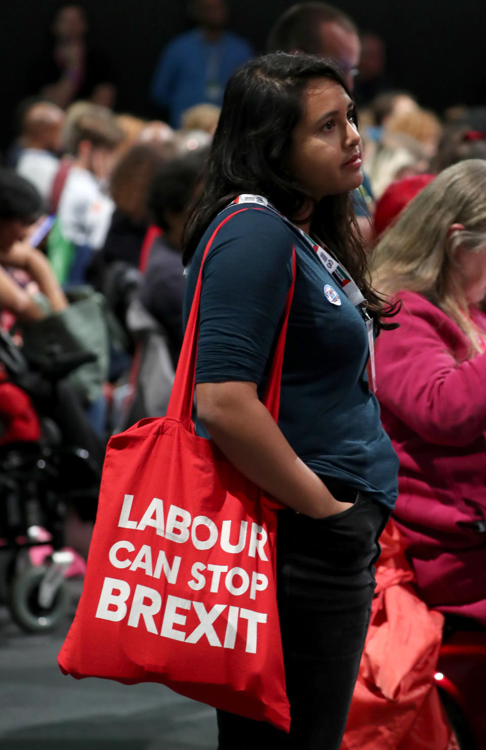 A delegate listens to speeches during the Labour Party Conference at the Brighton Centre in Brighton.