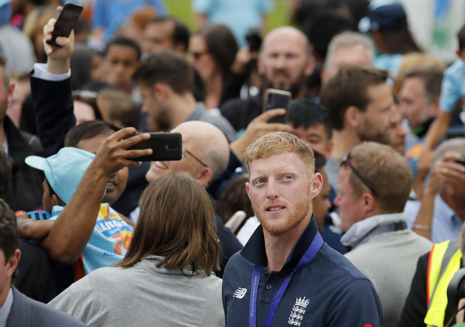 England's Ben Stokes makes his way through fans at the Oval in London, Monday, July 15, 2019 one day after they won the Cricket World Cup in a final match against New Zealand.(AP Photo/Frank Augstein)