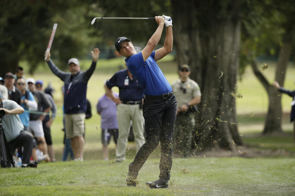 Cameron Champ follows his approach shot up to the third green of the Silverado Resort North Course during the final round of the Safeway Open PGA golf tournament Sunday, Sept. 29, 2019, in Napa, Calif. (AP Photo/Eric Risberg)