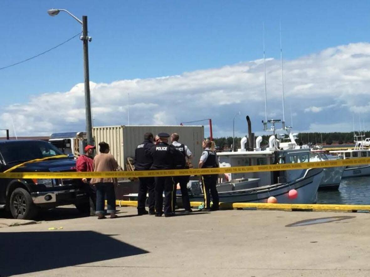 Justin MacKay and  Chris Melanson were killed when two lobster vessels collided off Beach Point, P.E.I., in June 2018.  (Alistair MacCormick/CBC - image credit)