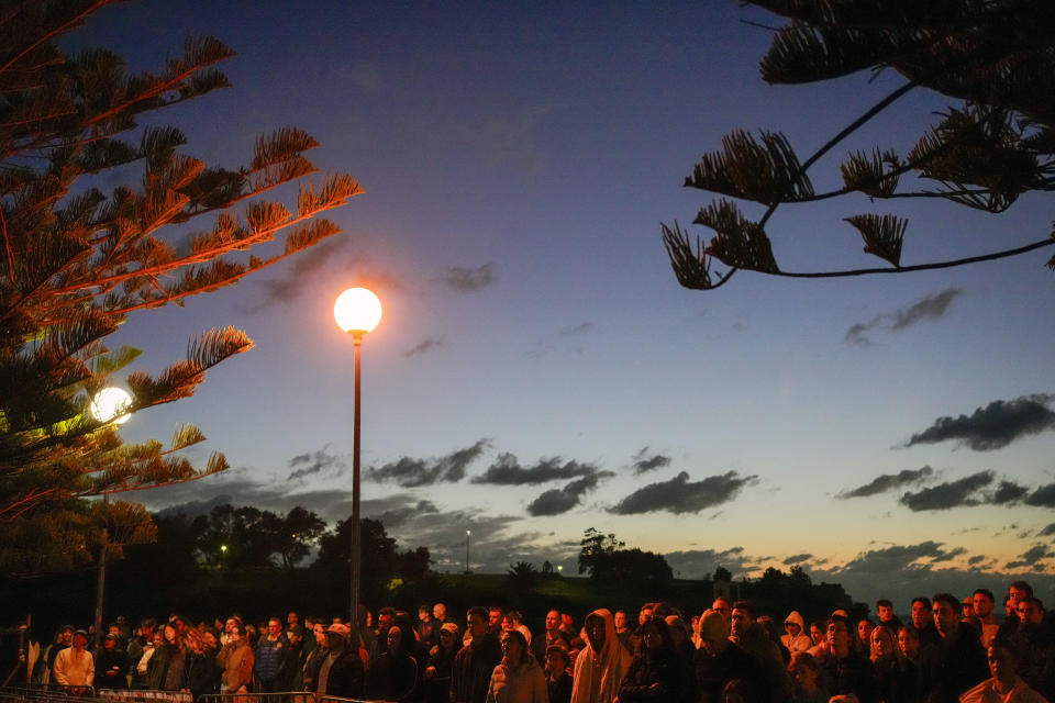 Crowds attend the Anzac Day dawn service at Coogee Beach in Sydney, Australia, Thursday, April 25, 2024. (AP Photo/Mark Baker)