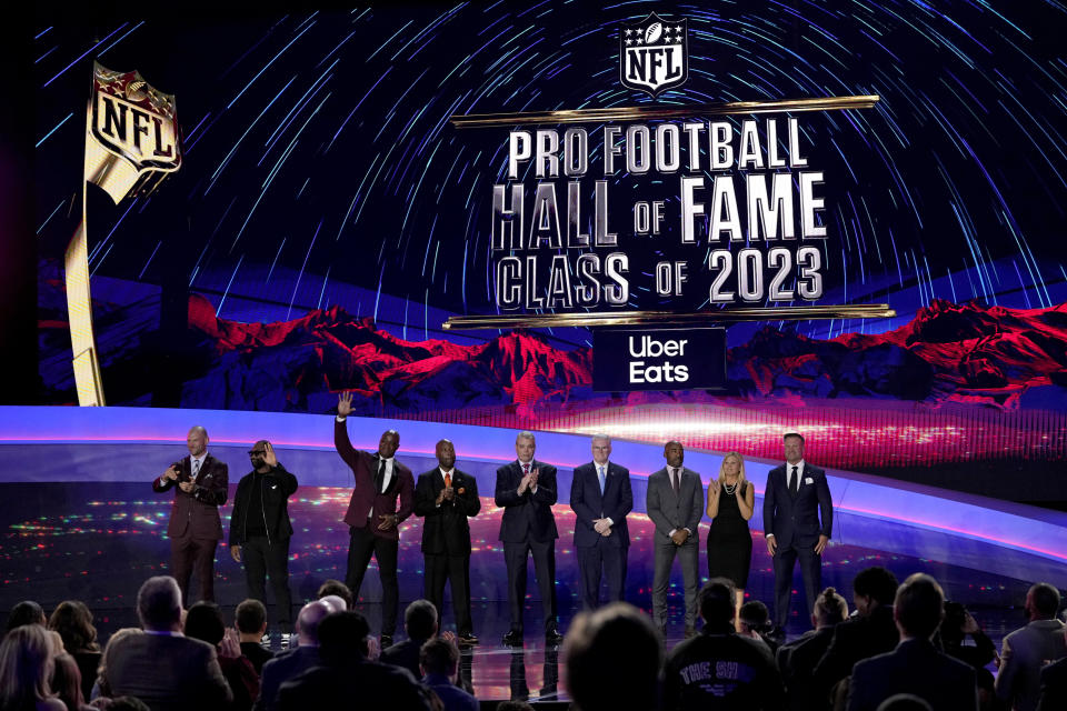 The Pro football Hall of Fame class of 2023 poses during the NFL Honors award show ahead of the Super Bowl 57 football game,Thursday, Feb. 9, 2023, in Phoenix. (AP Photo/David J. Phillip)