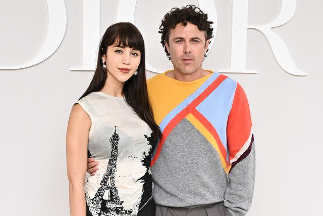 <p>Stephane Cardinale - Corbis/Corbis via Getty</p> Caylee Cowan and Casey Affleck