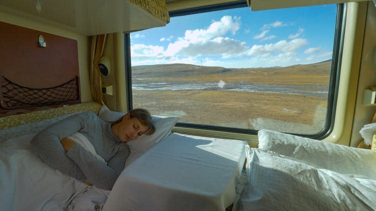 <span class="caption">Sleeper train operators promise comfort to entice would-be flyers.</span> <span class="attribution"><a class="link " href="https://www.shutterstock.com/image-photo/close-tired-girl-sleeps-her-sleeper-1510918502" rel="nofollow noopener" target="_blank" data-ylk="slk:Flystock/Shutterstock;elm:context_link;itc:0;sec:content-canvas">Flystock/Shutterstock</a></span>