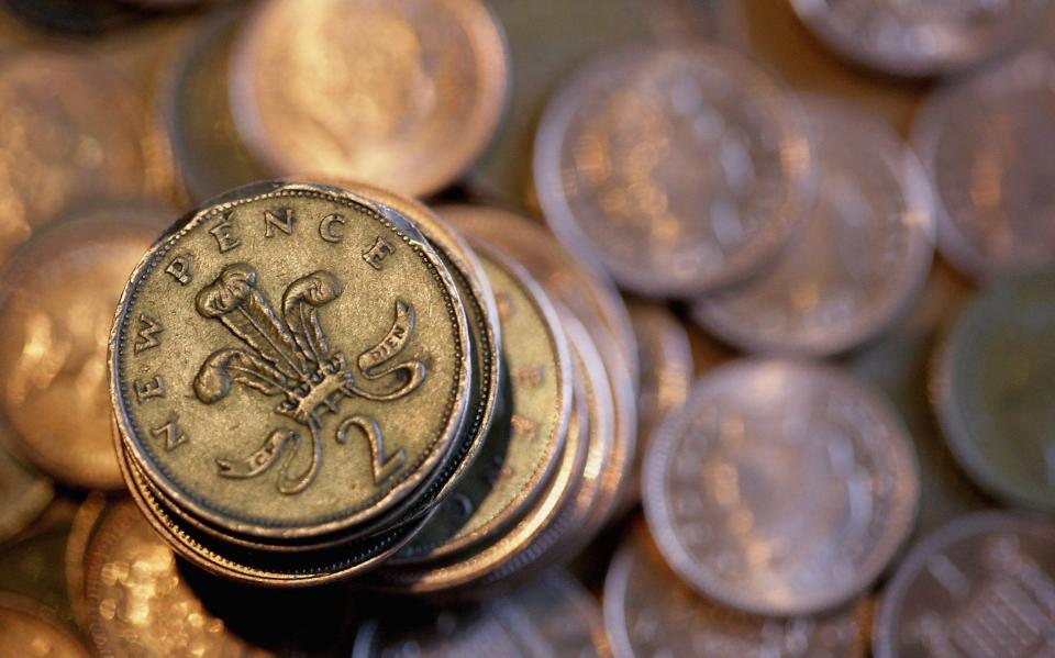 pile of two pence coins