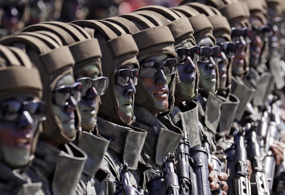 North Korean soldiers march during a parade for the 70th anniversary of North Korea's founding day in Pyongyang, North Korea, Sunday, Sept. 9, 2018. North Korea staged a major military parade, huge rallies and will revive its iconic mass games on Sunday to mark its 70th anniversary as a nation. (AP Photo/Kin Cheung)