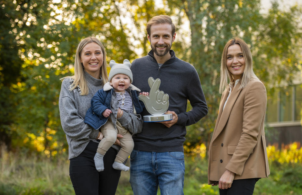 National Lottery Award winner Chris Sellar pictured with his wife, son, and Victoria Pendleton