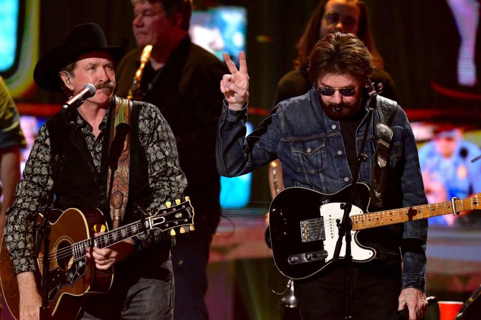 <p>Hubert Vestil/Getty</p> Kix Brooks and Ronnie Dunn of Brooks & Dunn perform a tribute to Toby Keith at the 2024 CMT Awards at the Moody Center in Austin, Texas on April 7, 2024
