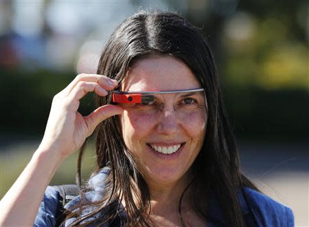 Defendant Cecilia Abadie smiles as she arrives at a traffic court in San Diego January 16, 2014. REUTERS/Mike Blake