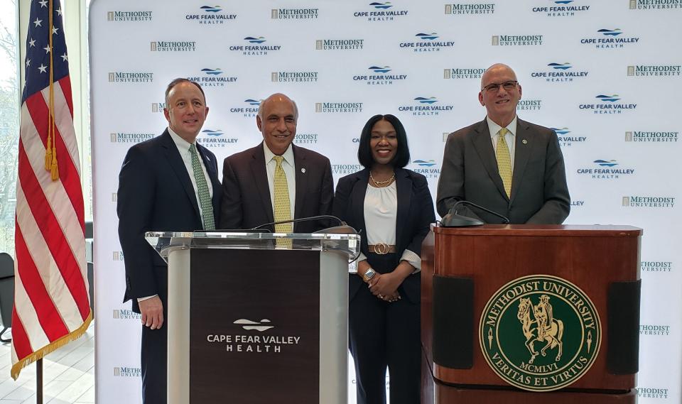 Officials with Cape Fear Valley Health System and Methodist University announced a partnership on a new medical school in a press conference on Monday, Feb. 27, 2023. From left are Mike Nagowski, Cape Fear Valley CEO; Dr. Rakesh Gupta, chairperson of the Methodist University Board of Trustees; Alicia Marks Flowers, chairperson of the Cape Fear Valley board; and Dr. Stanley T. Wearden, president of Methodist University. The event was held at he Thomas R. Mclean Health Sciences Building on the Methodist campus.