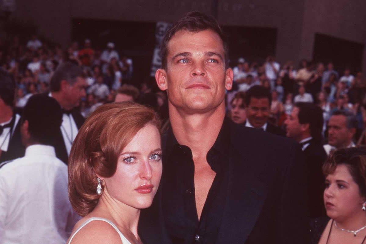 Anderson and her then-boyfriend Rodney Rowland at the Emmy Awards in 1997 (Getty Images)